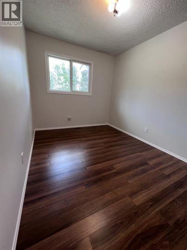 84 5550 Simpson Trail, Fort Nelson, BC - Indoor Photo Showing Other Room