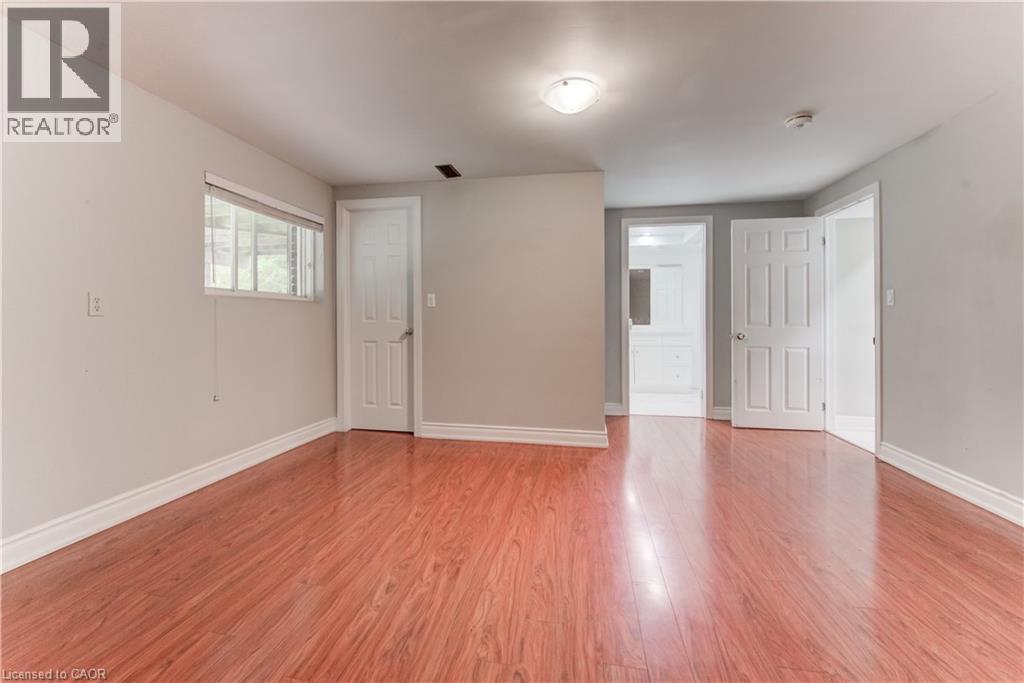 Spare room featuring light wood-type flooring and baseboards - 685 Briardean Road Unit# Lower, Cambridge, ON - Indoor Photo Showing Other Room