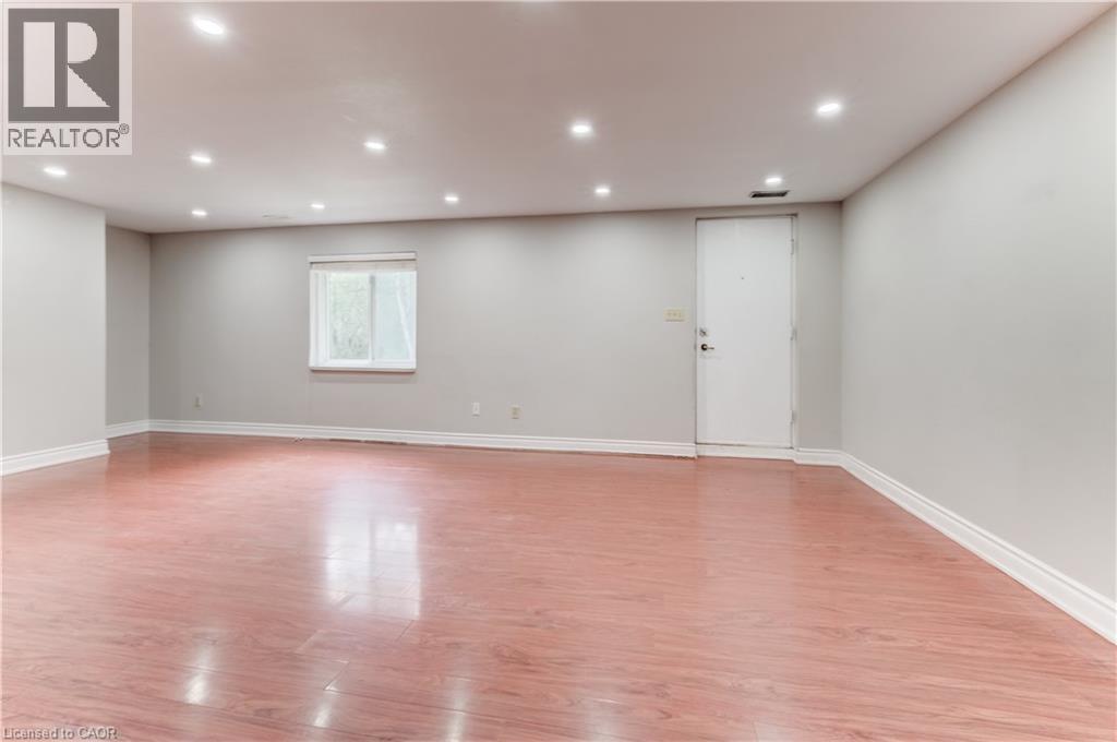 Spare room featuring light wood-type flooring and recessed lighting - 685 Briardean Road Unit# Lower, Cambridge, ON - Indoor Photo Showing Other Room