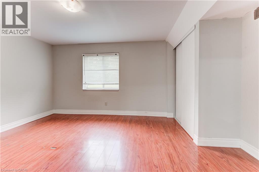 Unfurnished bedroom featuring light wood-type flooring and a closet - 685 Briardean Road Unit# Lower, Cambridge, ON - Indoor Photo Showing Other Room