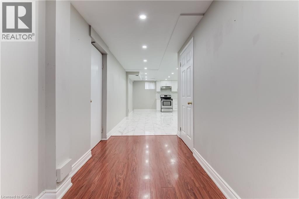 Hall with recessed lighting and light wood finished floors - 685 Briardean Road Unit# Lower, Cambridge, ON - Indoor Photo Showing Other Room