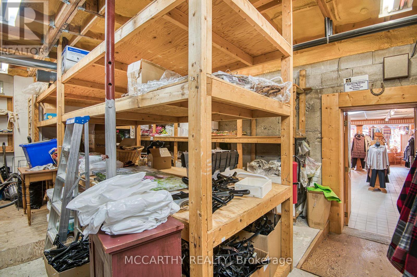 Storage with shelves - 21 Toronto Street S, Grey Highlands, ON