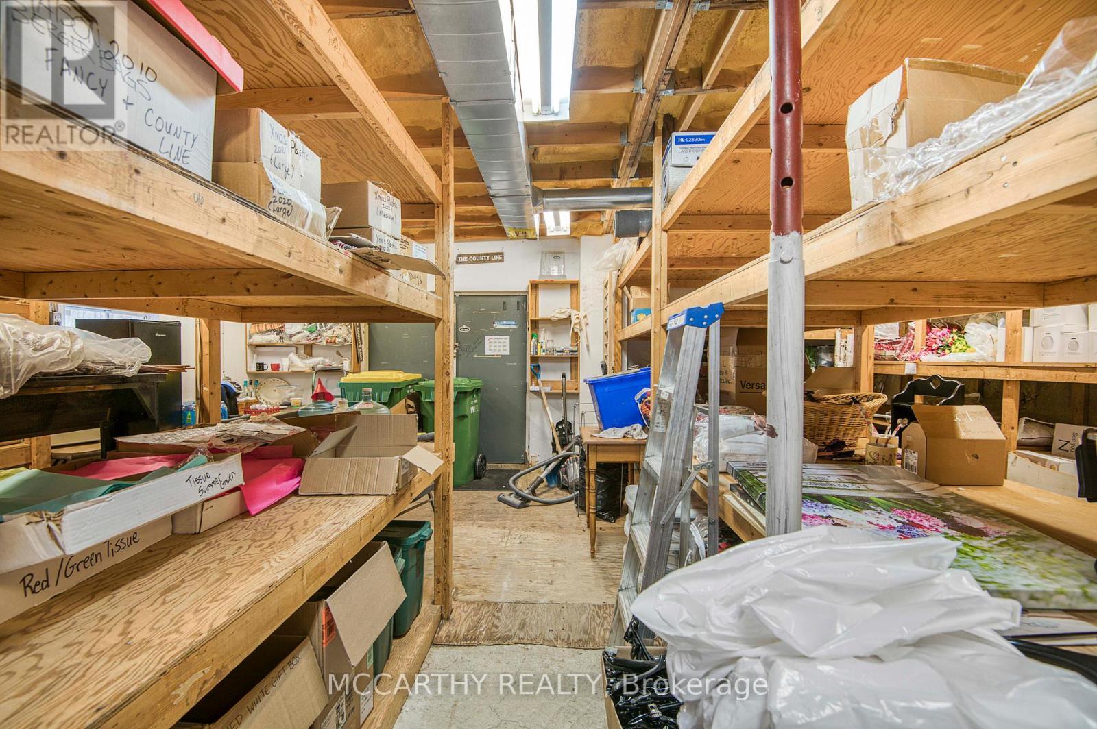 Storage with shelves - 21 Toronto Street S, Grey Highlands, ON