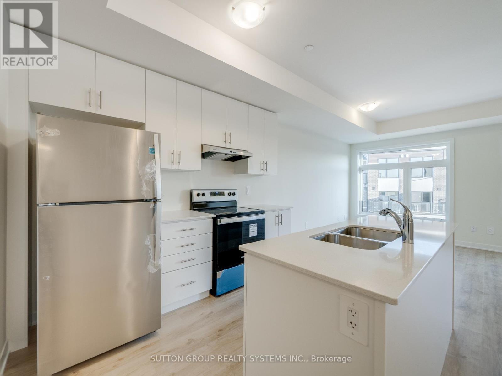 228 - 755 Omega Drive, Pickering, ON - Indoor Photo Showing Kitchen With Stainless Steel Kitchen With Double Sink With Upgraded Kitchen