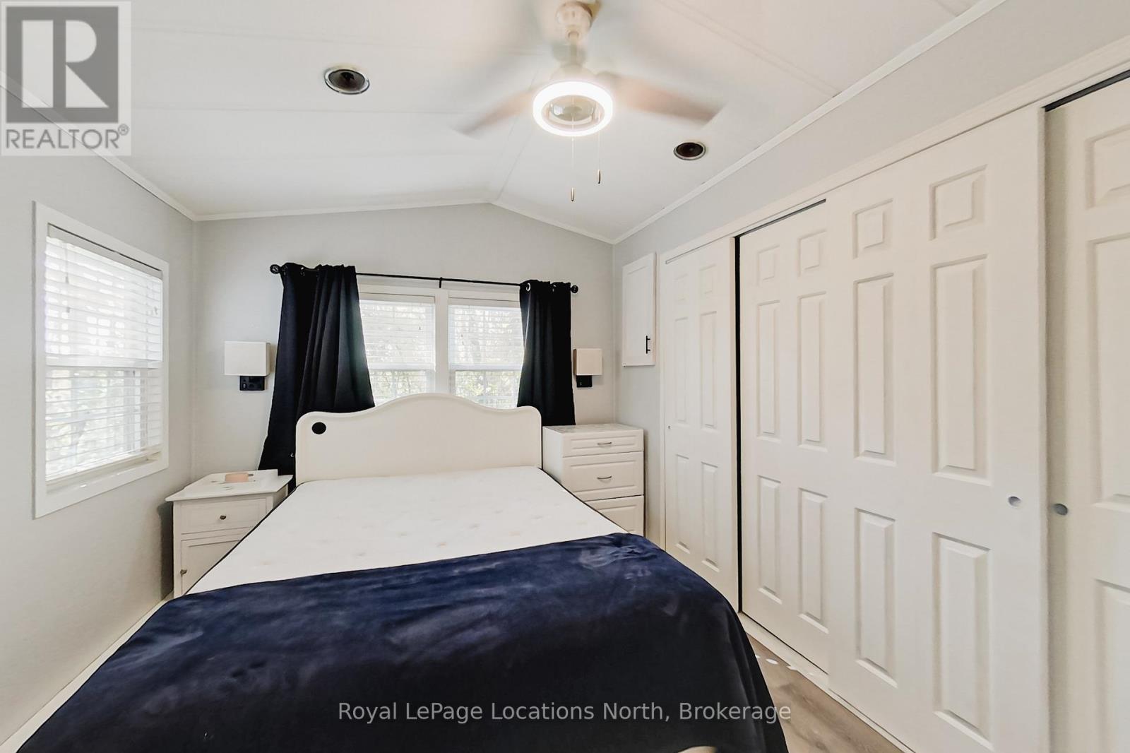8 Prince Edward Drive, Springwater, ON - Indoor Photo Showing Bedroom