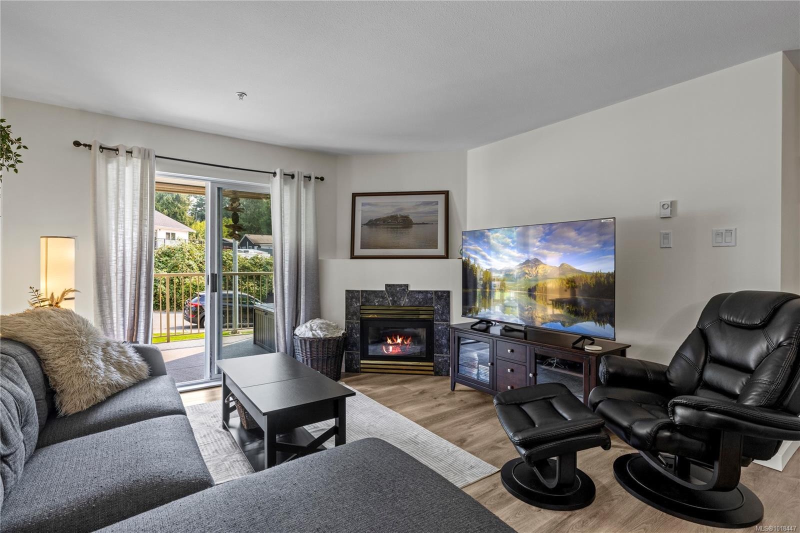 204-4971 Songbird Pl, Nanaimo, BC - Indoor Photo Showing Living Room With Fireplace