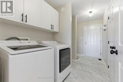 Main level laundry with inside entry to the garage -