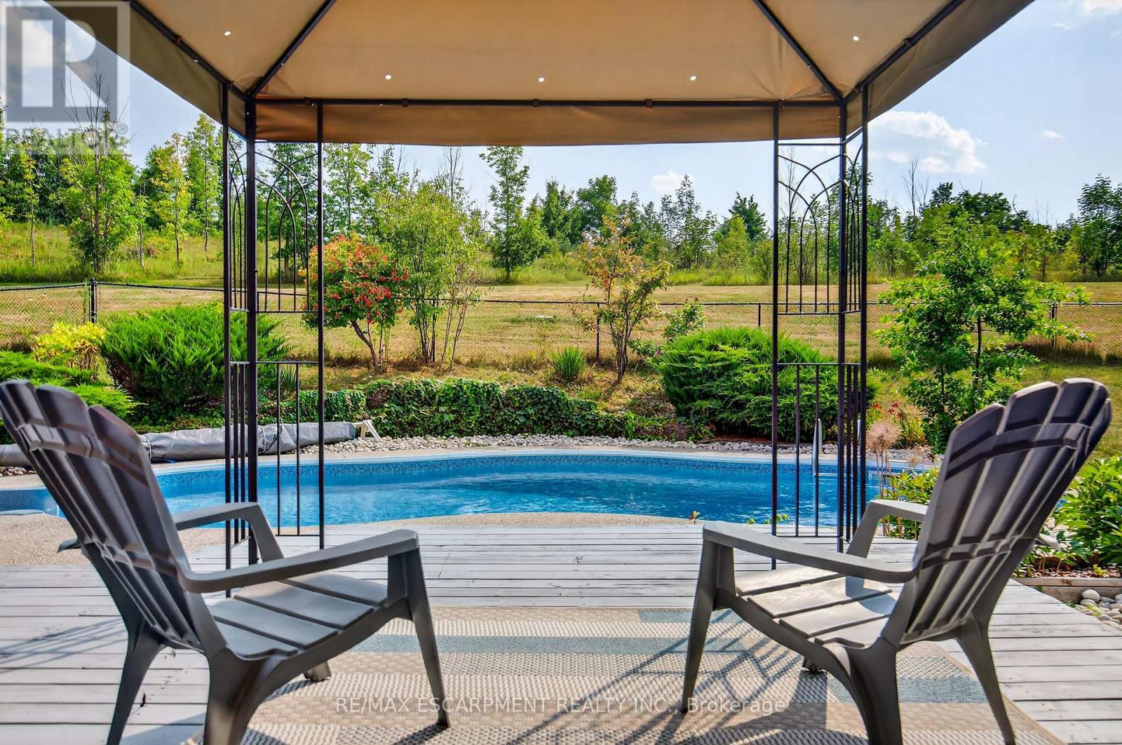 22 Weneil Drive, Hamilton, ON - Outdoor With In Ground Pool With Deck Patio Veranda