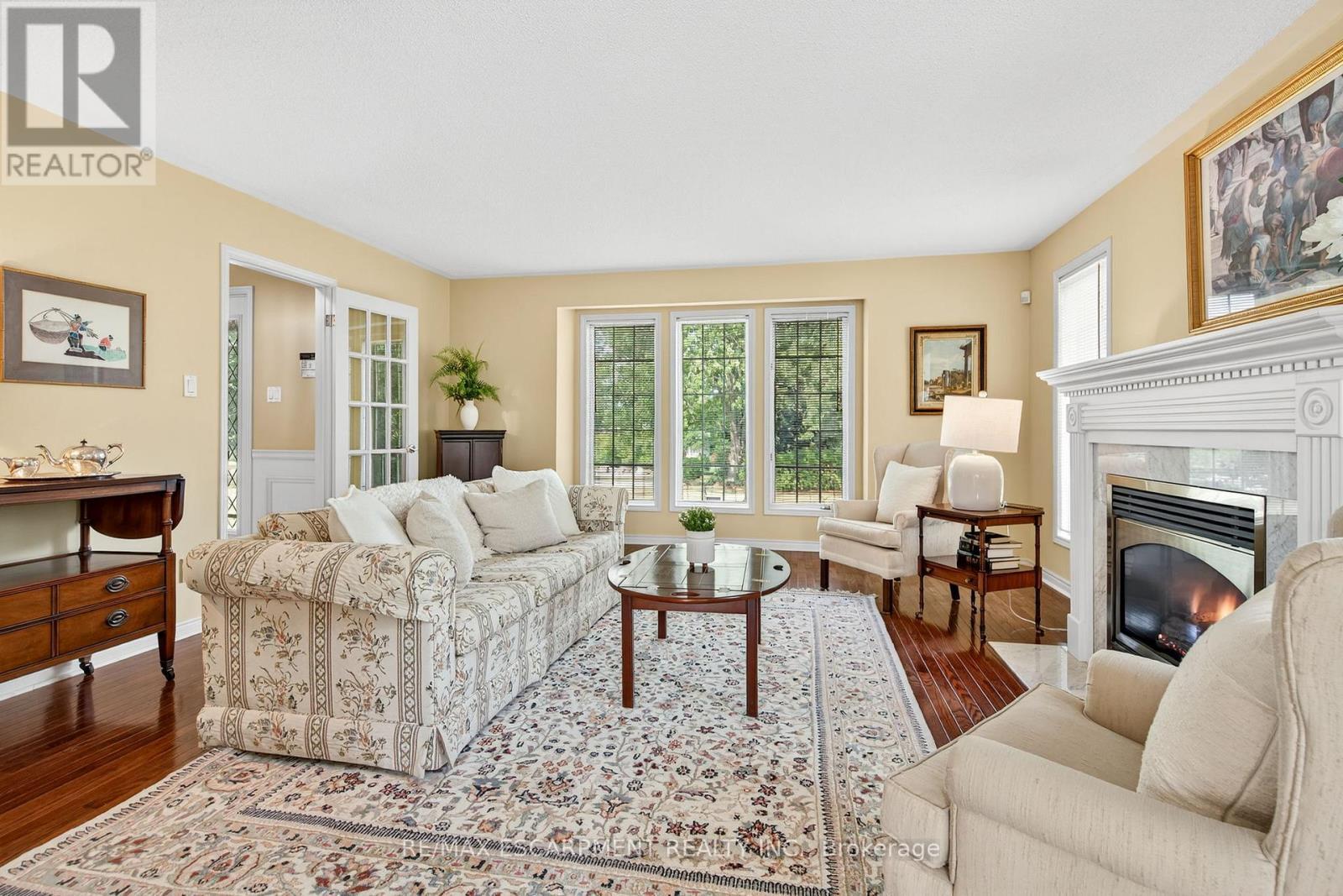 22 Weneil Drive, Hamilton, ON - Indoor Photo Showing Living Room With Fireplace