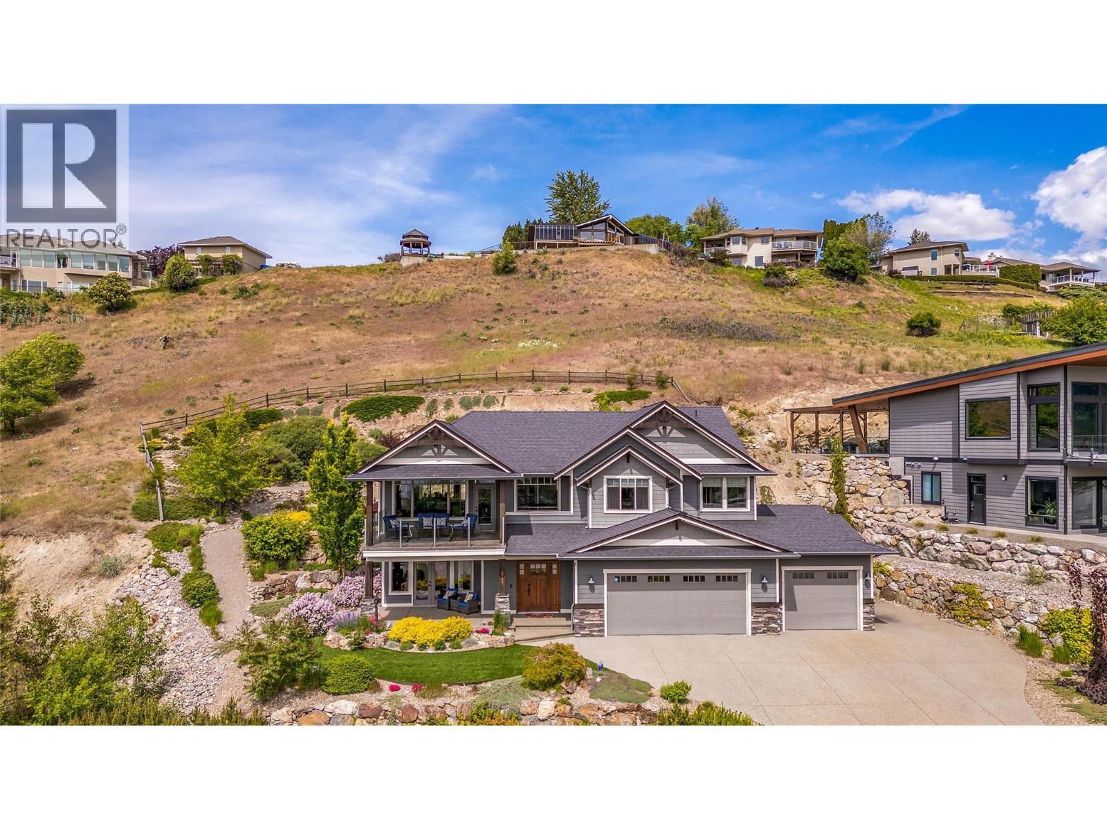 8780 Braeburn Drive, Coldstream, BC - Outdoor With Balcony With Facade