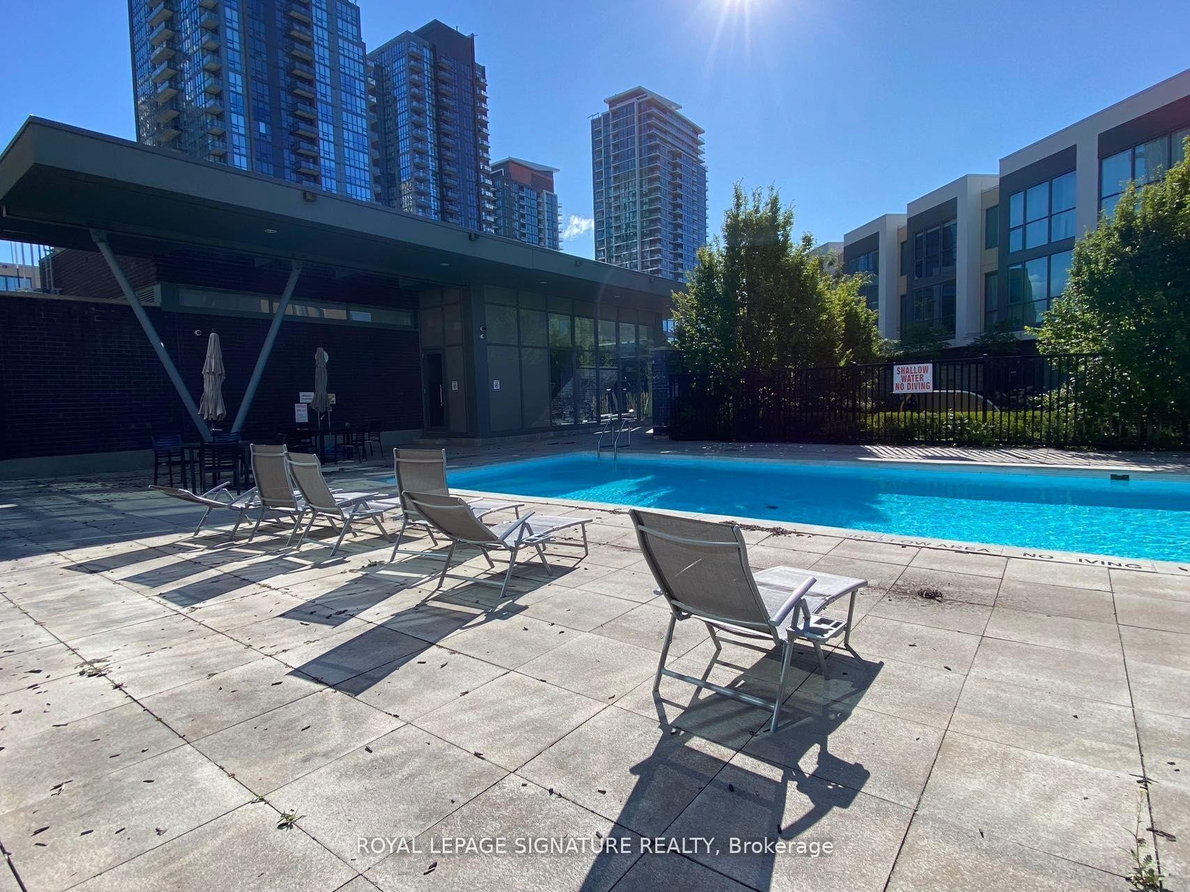 1-5040 Four Springs Avenue, Mississauga, ON - Outdoor With In Ground Pool