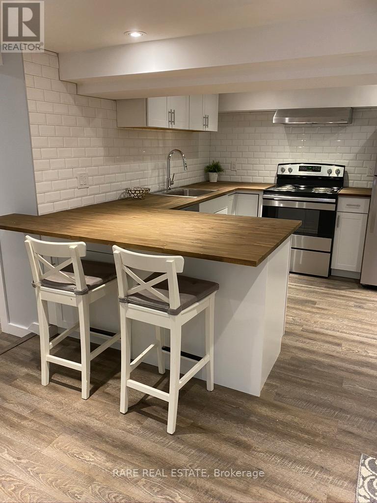 2491 Gerrard Street E, Toronto, ON - Indoor Photo Showing Kitchen With Double Sink