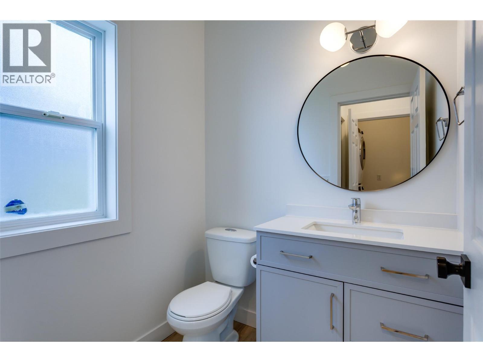 Main floor powder room - 388 Mccarren Avenue, Kelowna, BC - Indoor Photo Showing Bathroom