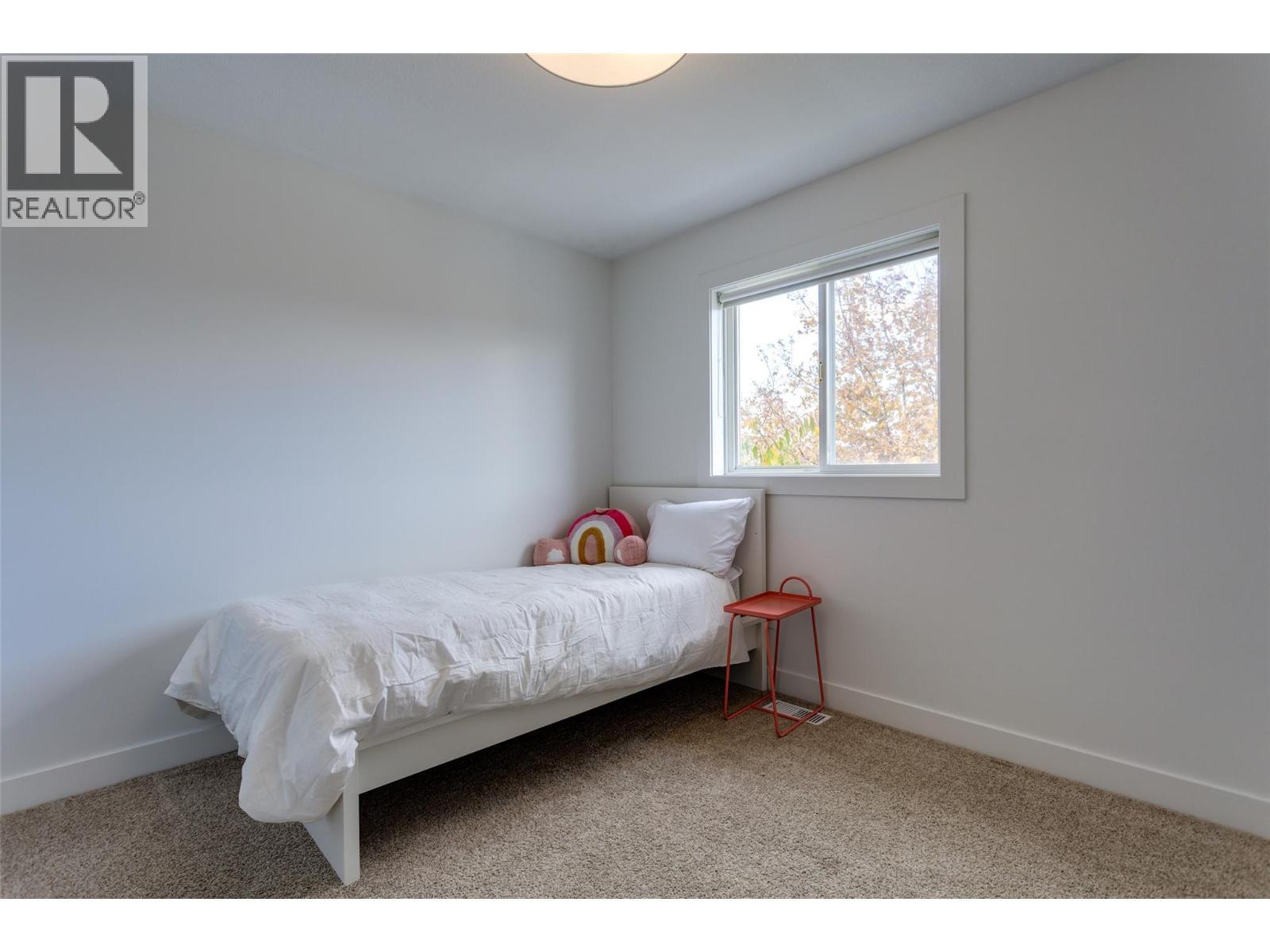 3rd main home bedroom - 388 Mccarren Avenue, Kelowna, BC - Indoor Photo Showing Bedroom