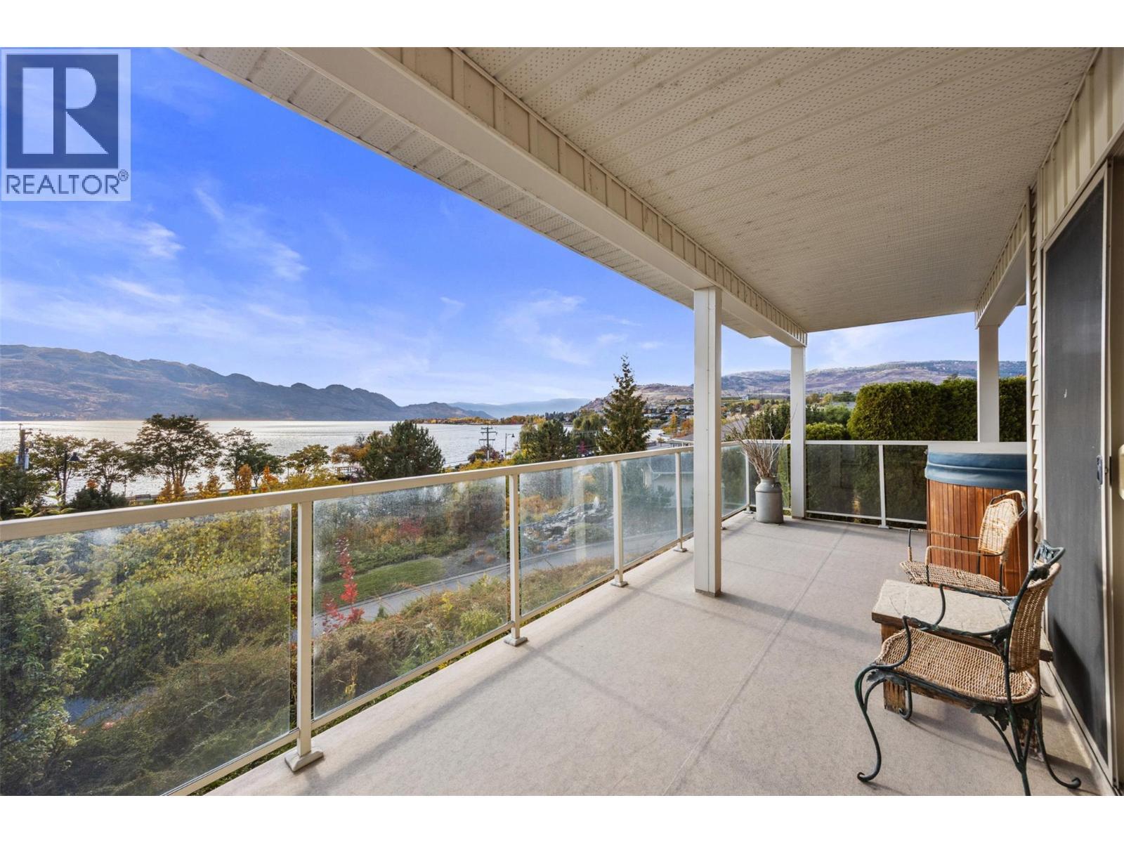 Bottom Patio with hot tub - 2100 Boucherie Road Unit# 28, West Kelowna, BC - Outdoor With View With Exterior