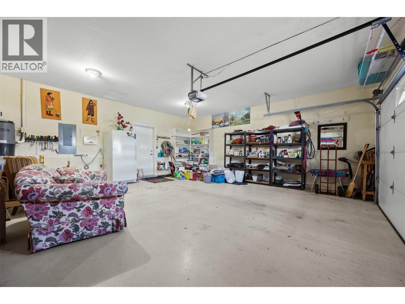 Oversized two car garage. - 2100 Boucherie Road Unit# 28, West Kelowna, BC - Indoor Photo Showing Garage