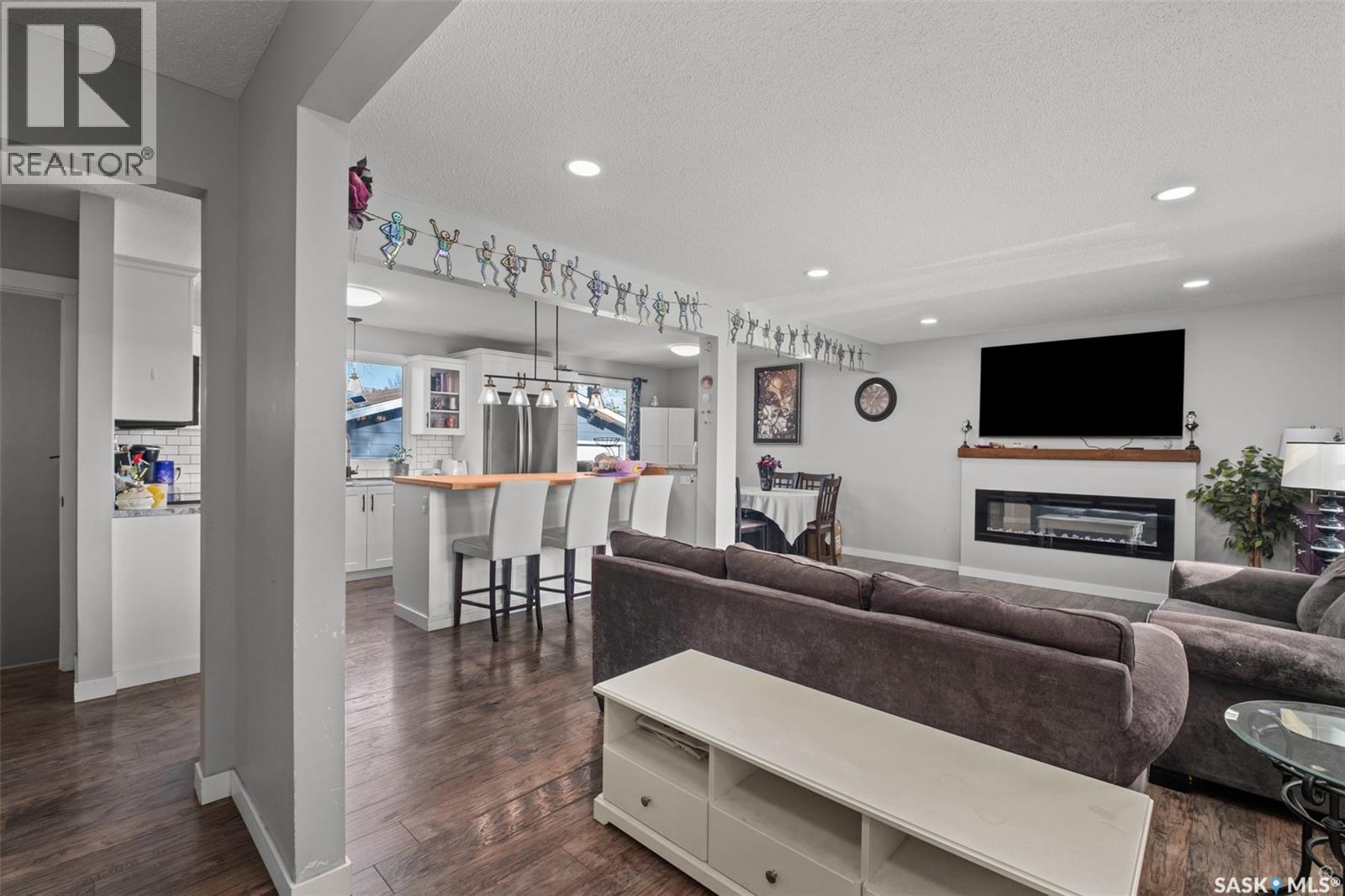 724 Eastwood Street, Prince Albert, SK - Indoor Photo Showing Living Room With Fireplace