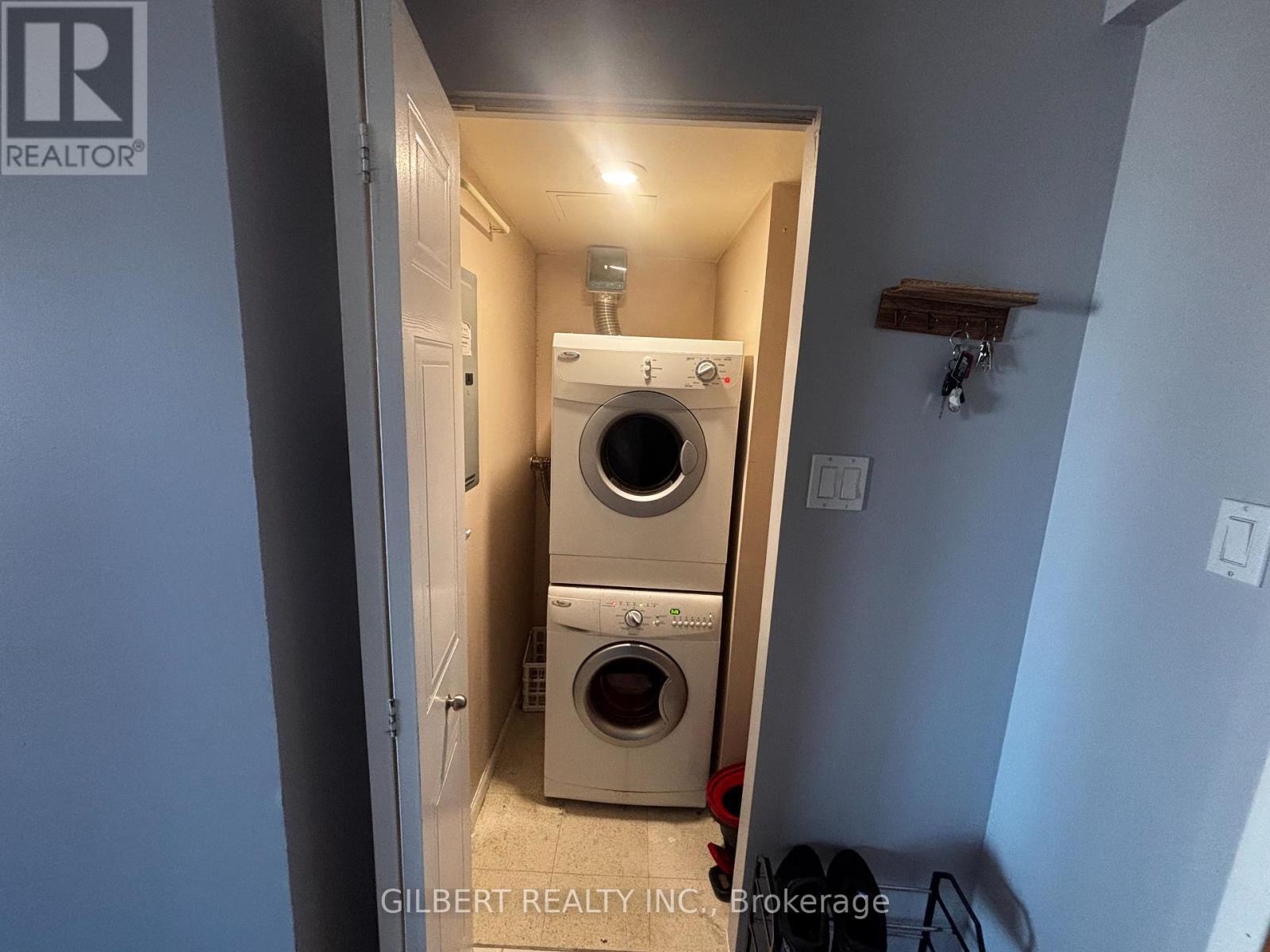 1201 - 65 Ellen Street, Barrie, ON - Indoor Photo Showing Laundry Room
