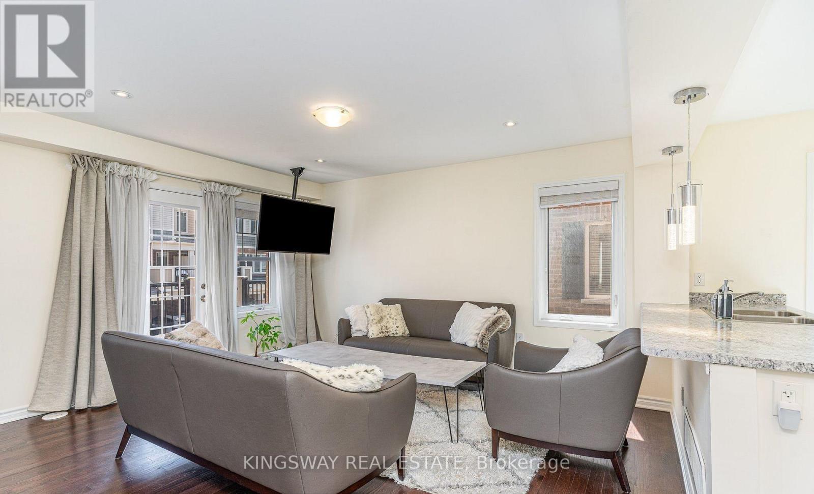 47 - 1000 Asleton Boulevard N, Milton, ON - Indoor Photo Showing Living Room