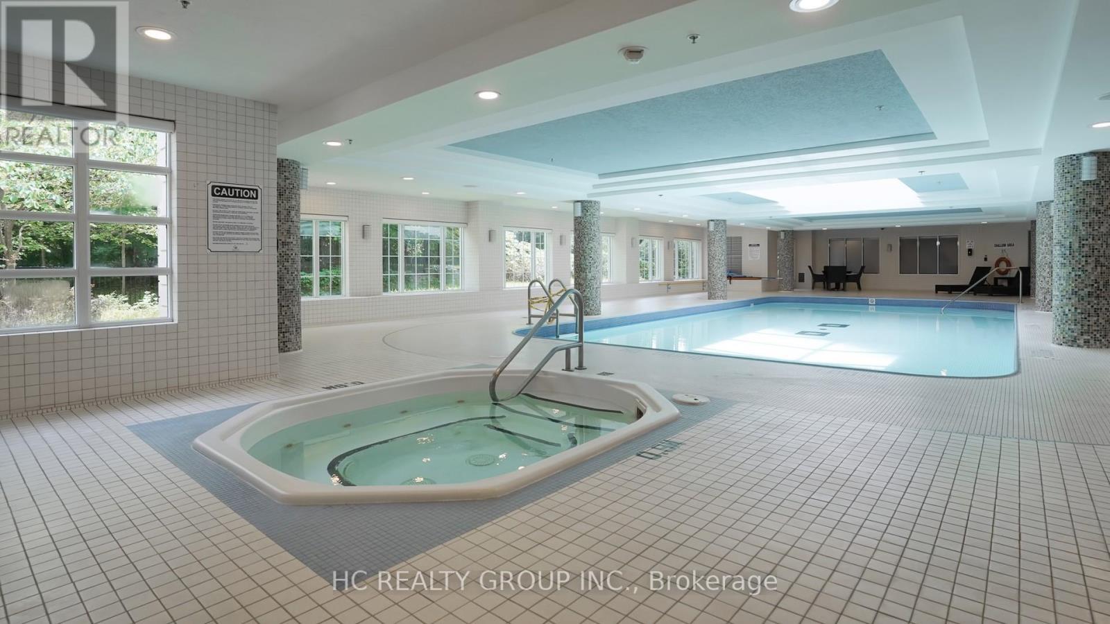 519 - 10 Bloorview Place, Toronto, ON - Indoor Photo Showing Other Room With In Ground Pool