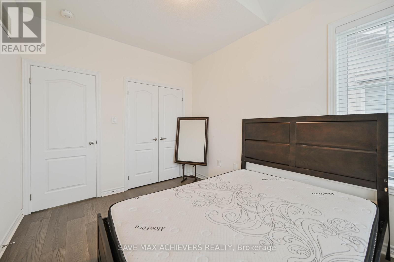 4 Hashmi Place, Brampton, ON - Indoor Photo Showing Bedroom