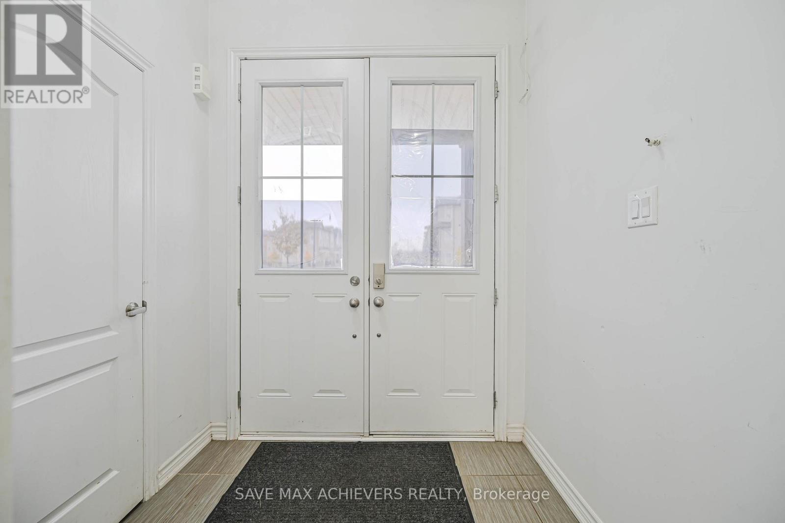 4 Hashmi Place, Brampton, ON - Indoor Photo Showing Other Room