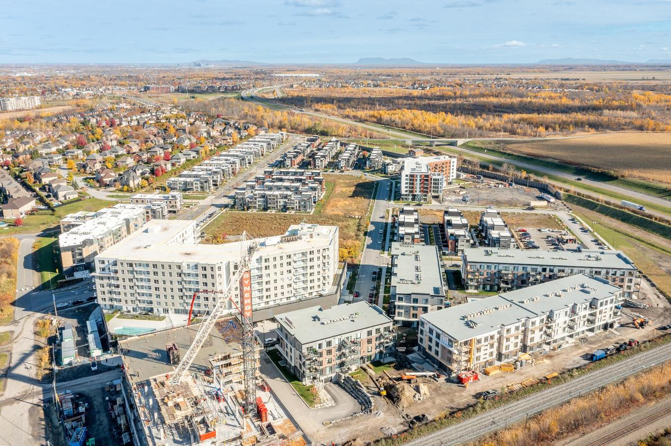 Aerial photo - 305-455 Rue Des Marronniers, Candiac, QC - Outdoor With View