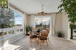 Dining room patio doors to deck with BBQ hookup -