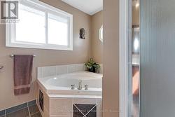 Deep soaker tub & separate spa shower -