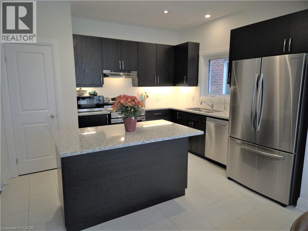 293 Chokecherry Crescent, Waterloo, ON - Indoor Photo Showing Kitchen With Stainless Steel Kitchen With Upgraded Kitchen