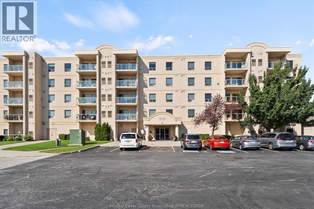 315 Village Grove Unit# 203, Tecumseh, ON - Outdoor With Balcony With Facade