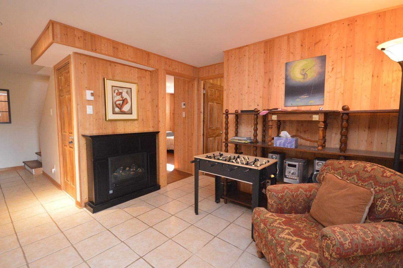 Family room - 12642 Ch. Du Lac-Labelle, Labelle, QC - Indoor Photo Showing Living Room With Fireplace