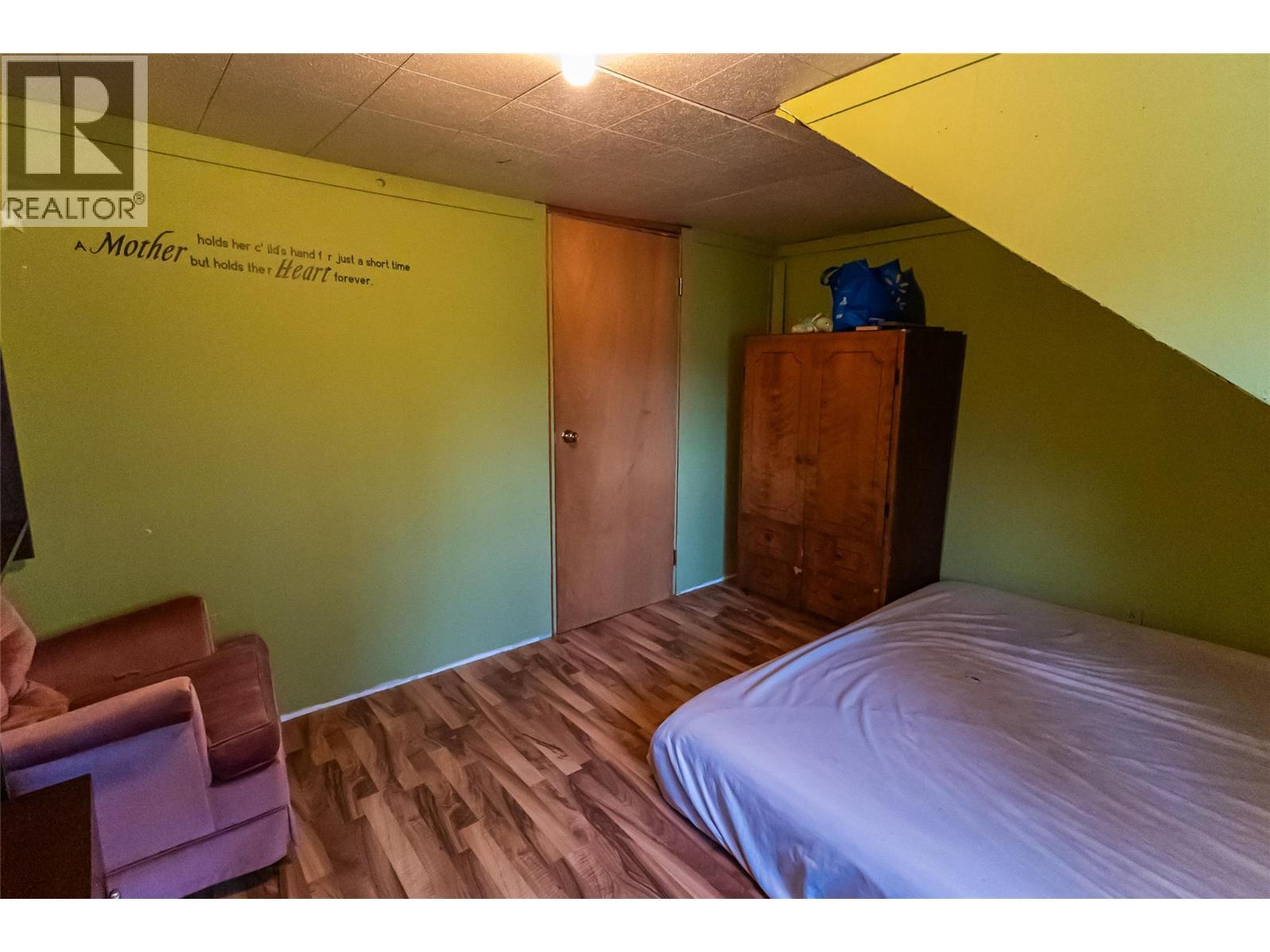 4912 47 Avenue, Pouce Coupe, BC - Indoor Photo Showing Bedroom