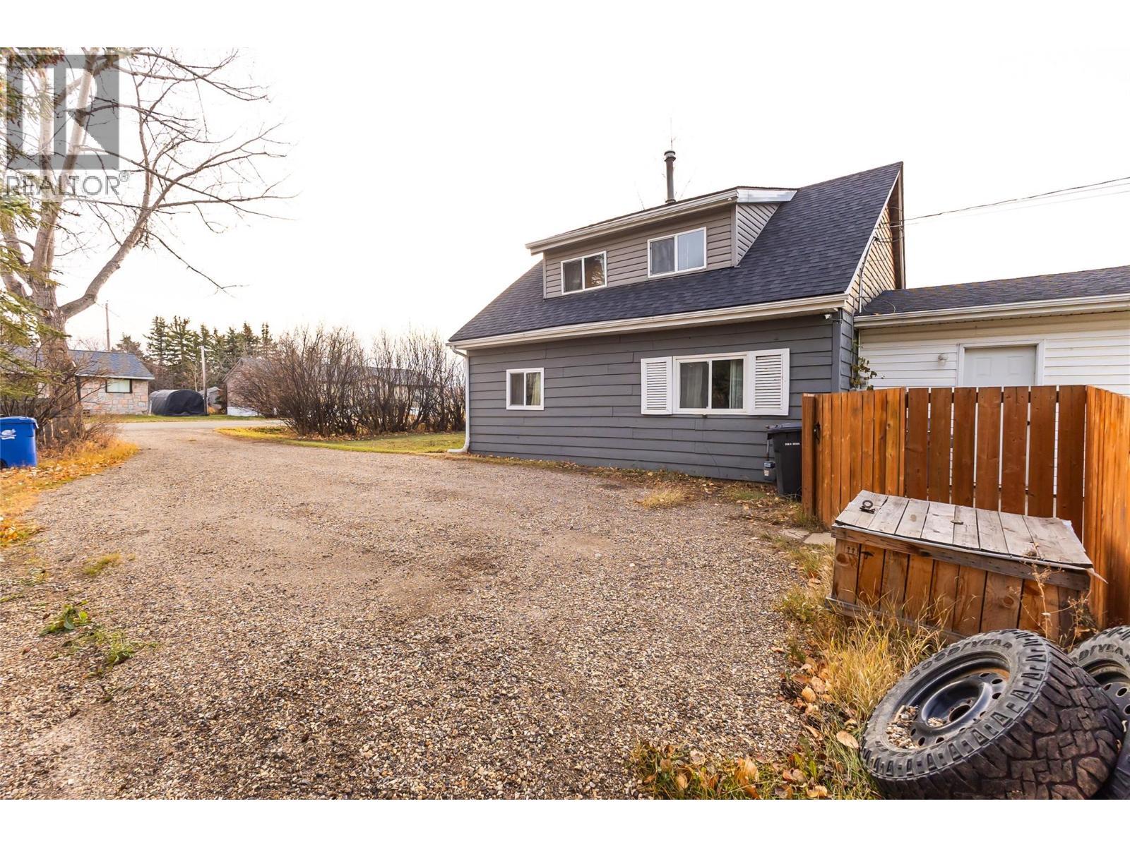 4912 47 Avenue, Pouce Coupe, BC - Outdoor With Exterior