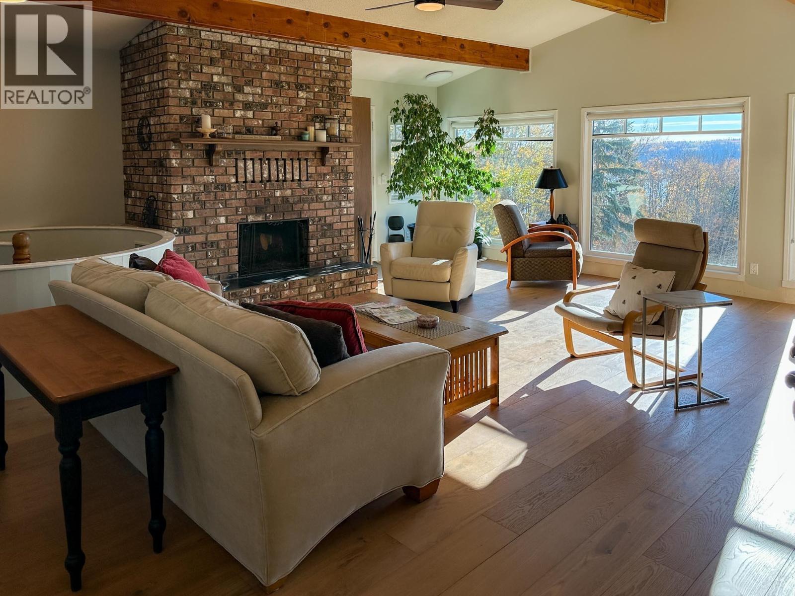 8137 Sinkut Lake Road, Vanderhoof, BC - Indoor Photo Showing Living Room With Fireplace