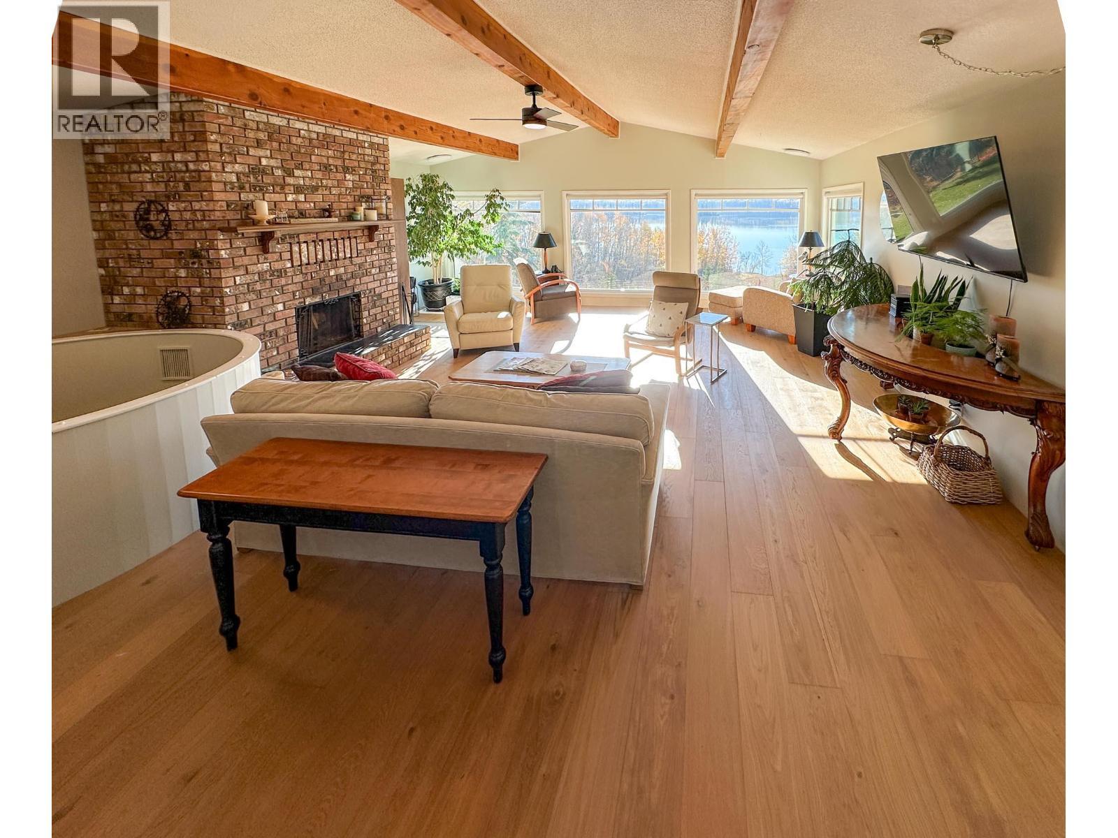 8137 Sinkut Lake Road, Vanderhoof, BC - Indoor Photo Showing Living Room With Fireplace