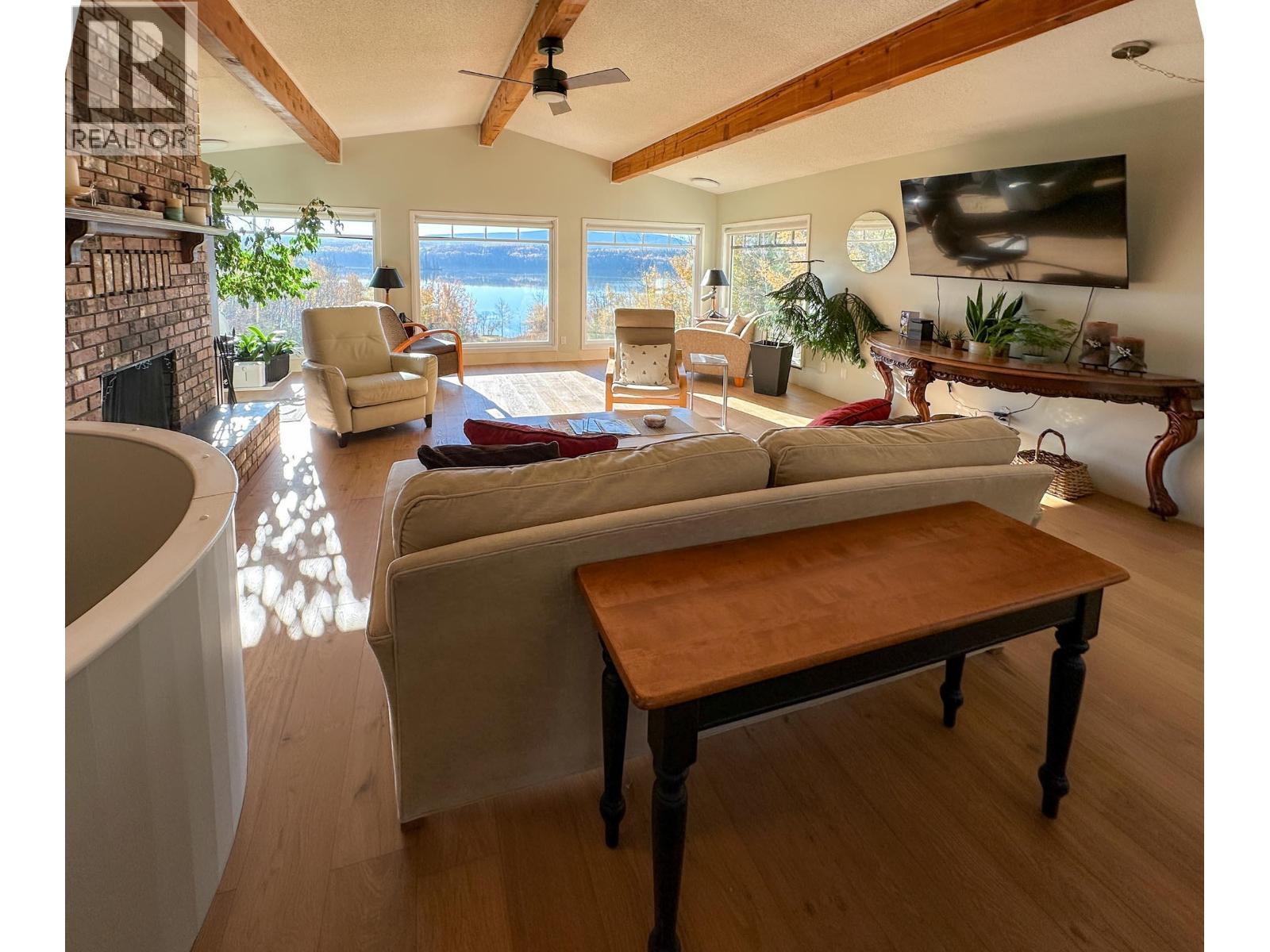8137 Sinkut Lake Road, Vanderhoof, BC - Indoor Photo Showing Living Room With Fireplace