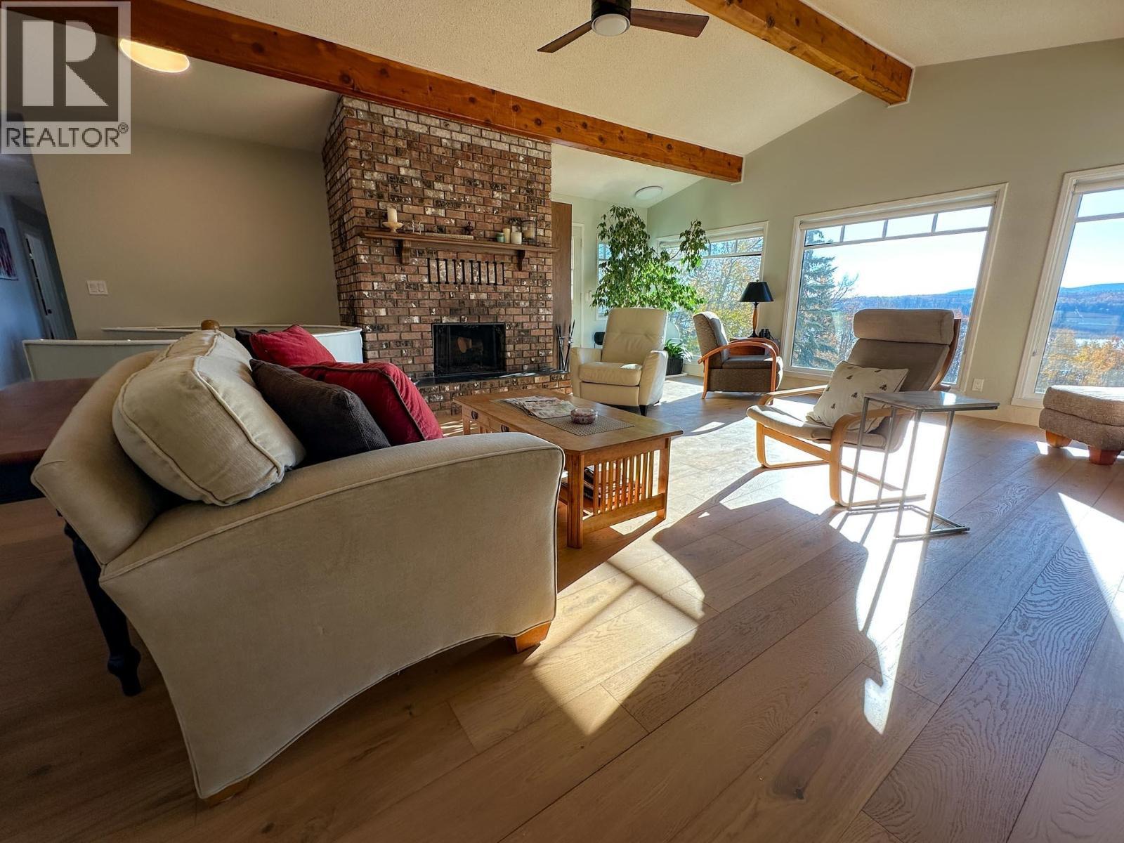 8137 Sinkut Lake Road, Vanderhoof, BC - Indoor Photo Showing Living Room With Fireplace