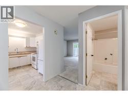 145-Redwing-Pl-Unit7-Oliver-BC-Riccardo-Manazza- exp realty View of the Hallway from second bedroom -