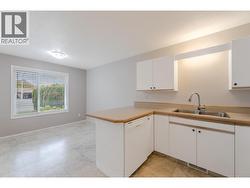 145-Redwing-Pl-Unit7-Oliver-BC-Riccardo-Manazza- exp realty View of the Kitchen -