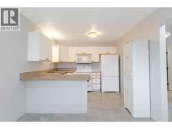 145-Redwing-Pl-Unit7-Oliver-BC-Riccardo-Manazza- exp realty View of the Kitchen -