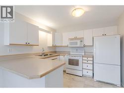 145-Redwing-Pl-Unit7-Oliver-BC-Riccardo-Manazza- exp realty View of the Kitchen -