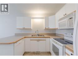 145-Redwing-Pl-Unit7-Oliver-BC-Riccardo-Manazza- exp realty View of the Kitchen -