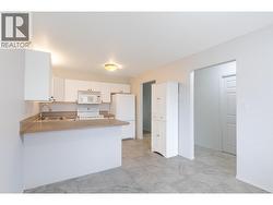 145-Redwing-Pl-Unit7-Oliver-BC-Riccardo-Manazza- exp realty View of the Kitchen -