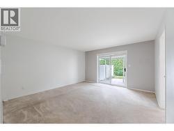 145-Redwing-Pl-Unit7-Oliver-BC-Riccardo-Manazza- exp realty View of the Living room -