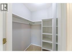 145-Redwing-Pl-Unit7-Oliver-BC-Riccardo-Manazza- exp realty View of the walk in closet of the Primary bedroom -