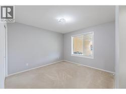 145-Redwing-Pl-Unit7-Oliver-BC-Riccardo-Manazza- exp realty View of the Second Bedroom -