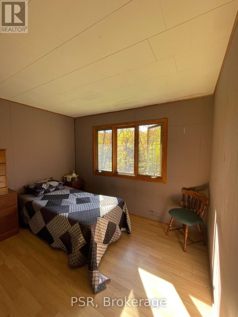 1094 Morinus Road, Muskoka Lakes (Medora), ON - Indoor Photo Showing Bedroom