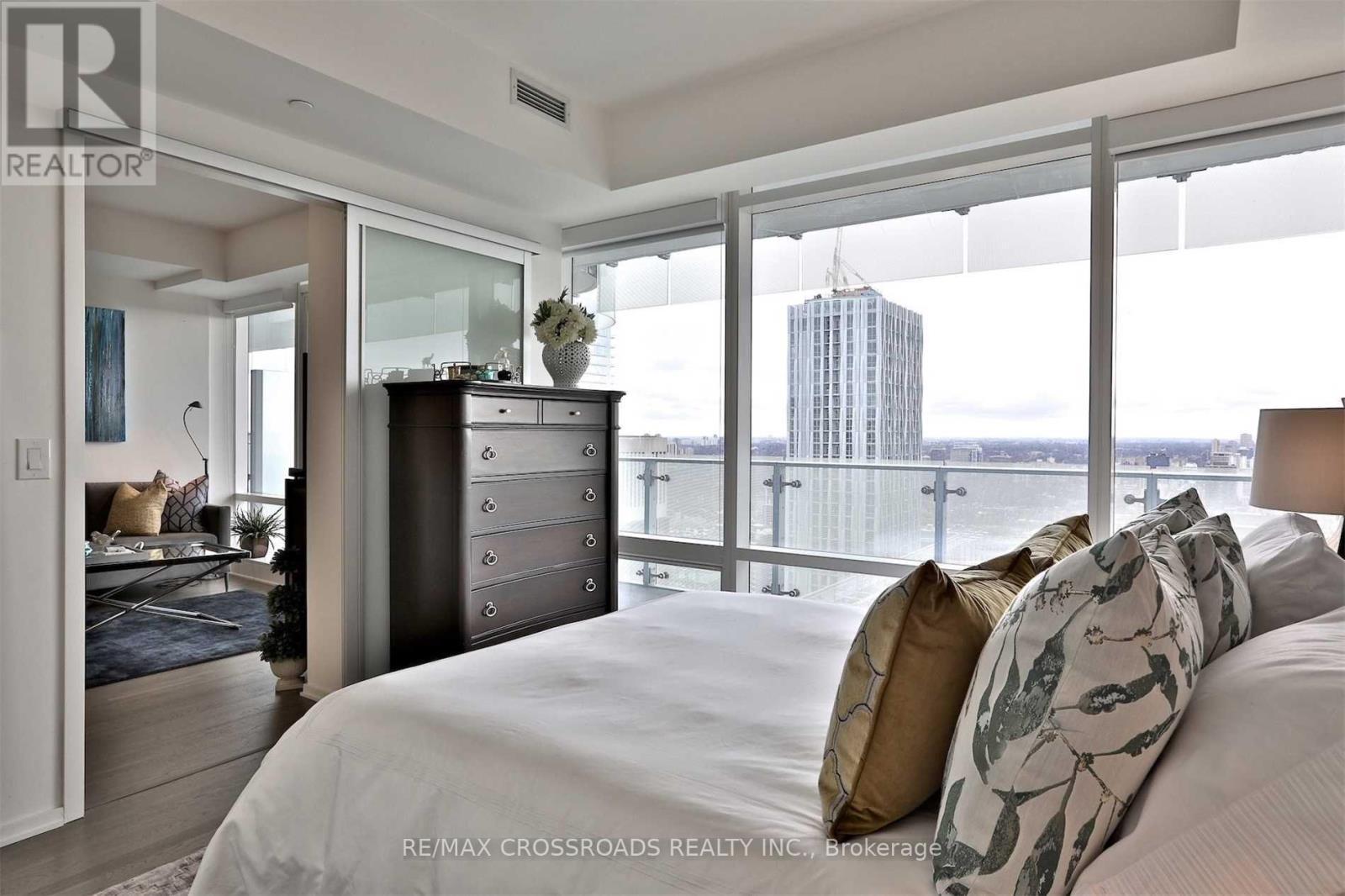 Large Windows Overlooking Clear View - 5010 - 1 Bloor Street E, Toronto, ON - Indoor Photo Showing Bedroom