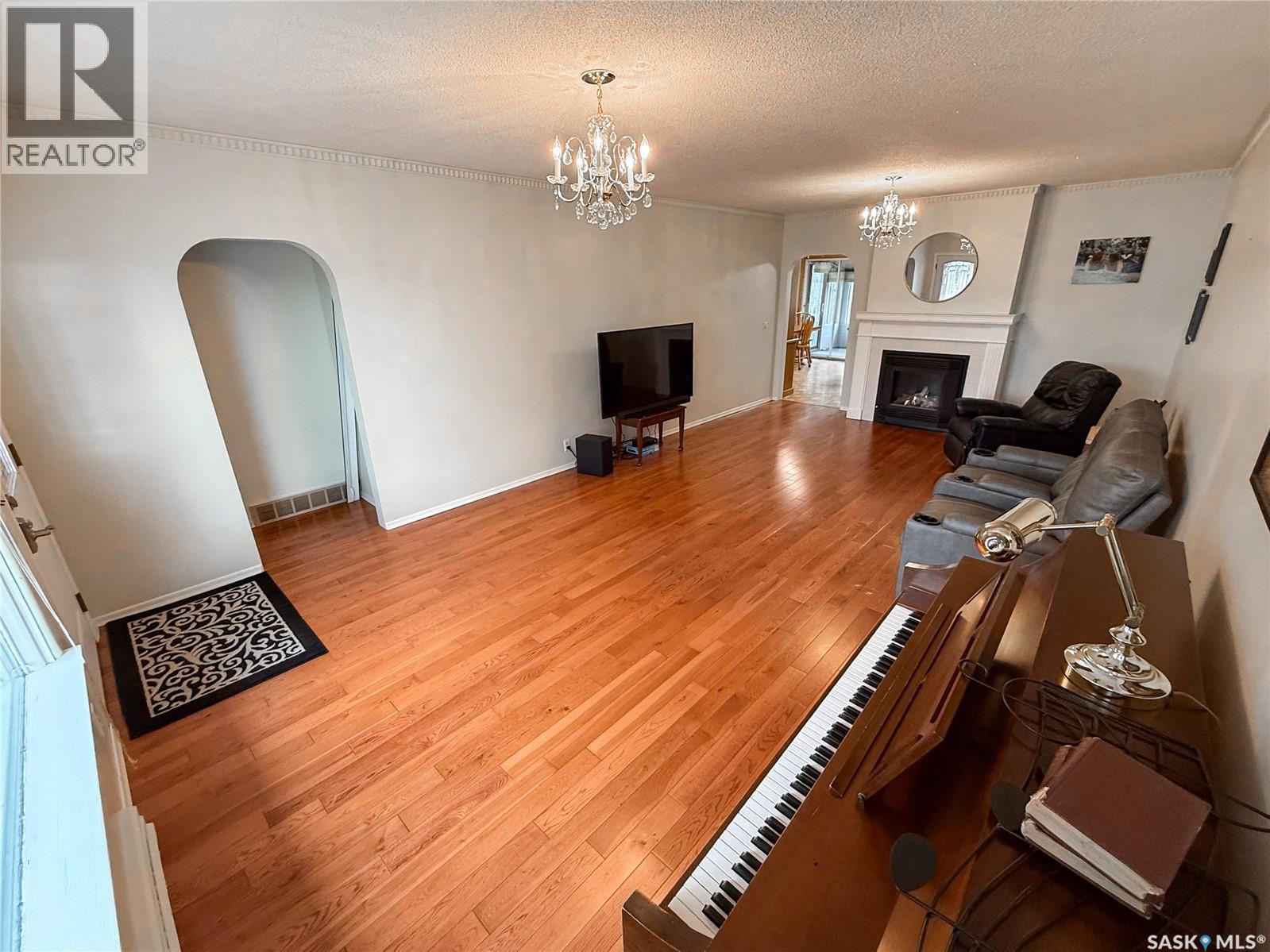 220 1St Street W, Ponteix, SK - Indoor With Fireplace